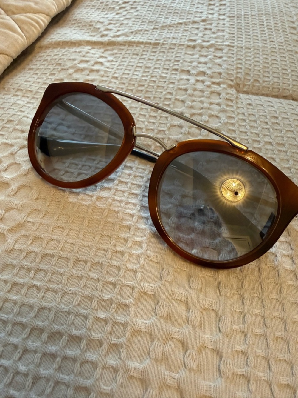 Prada Round Tortoise Frame Sunglasses with Silver Bridge